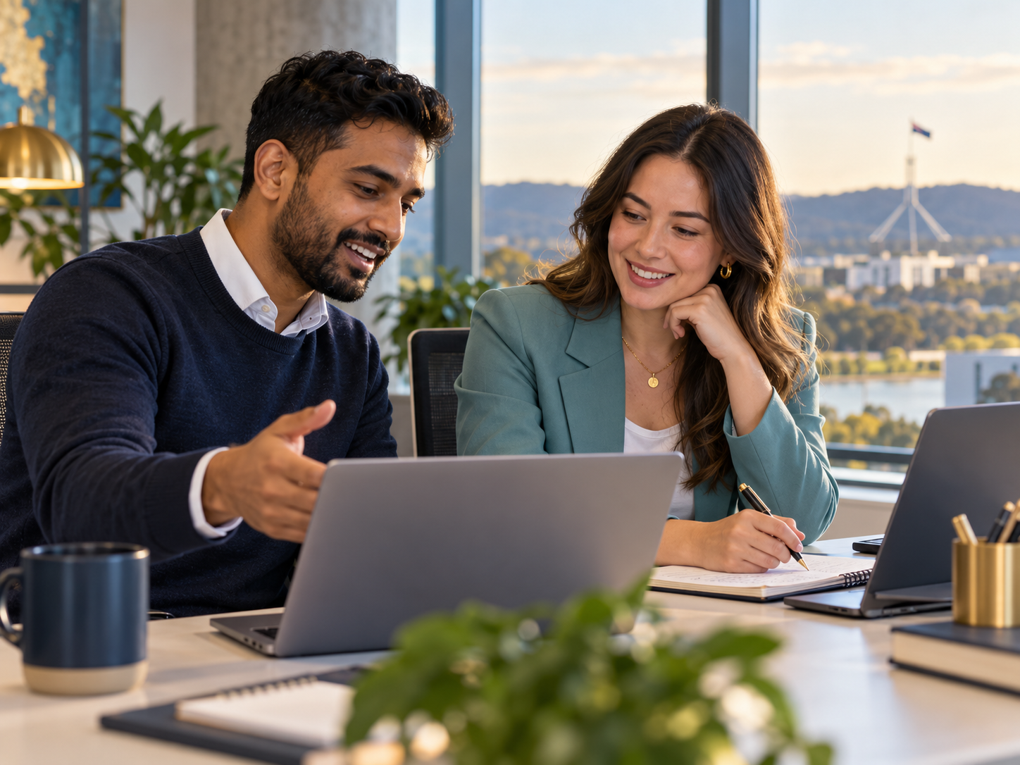 Illustrative image of two professionals reviewing work together